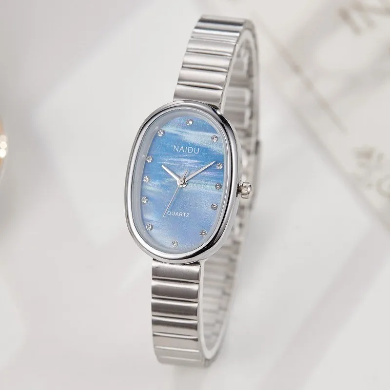 Women Quartz Watch Luxury Oval Shaped Fashion Mini Case Small Roman Numeral Dial Female Full Metal Band Watches Niche Wristwatch