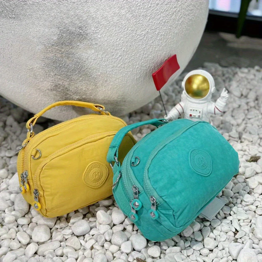 Women's Multi-Pocket Nylon Crossbody Bag, Fashionable Handbag Message Bag with Removable Shoulder Strap. view 2