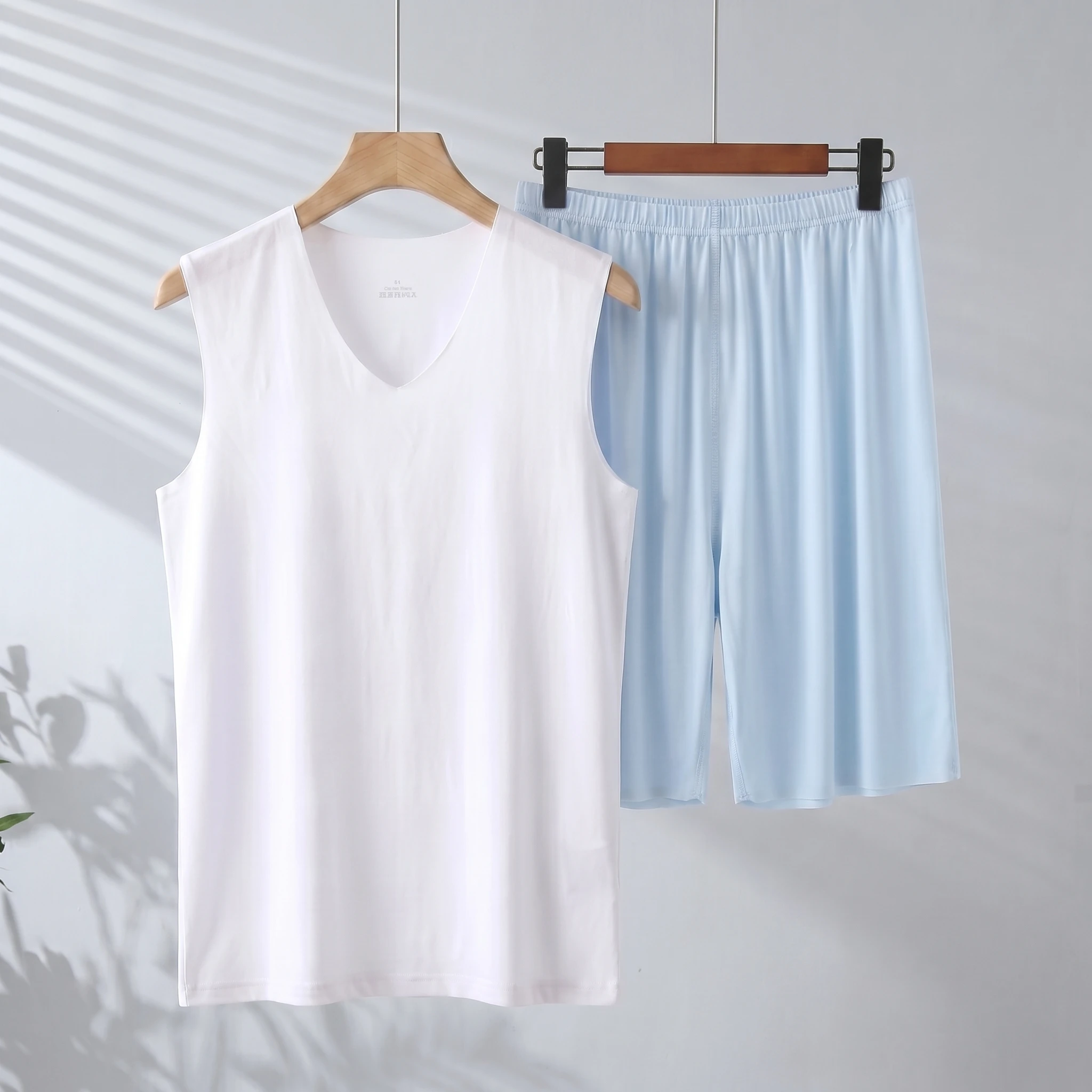 White vest + light blue shorts