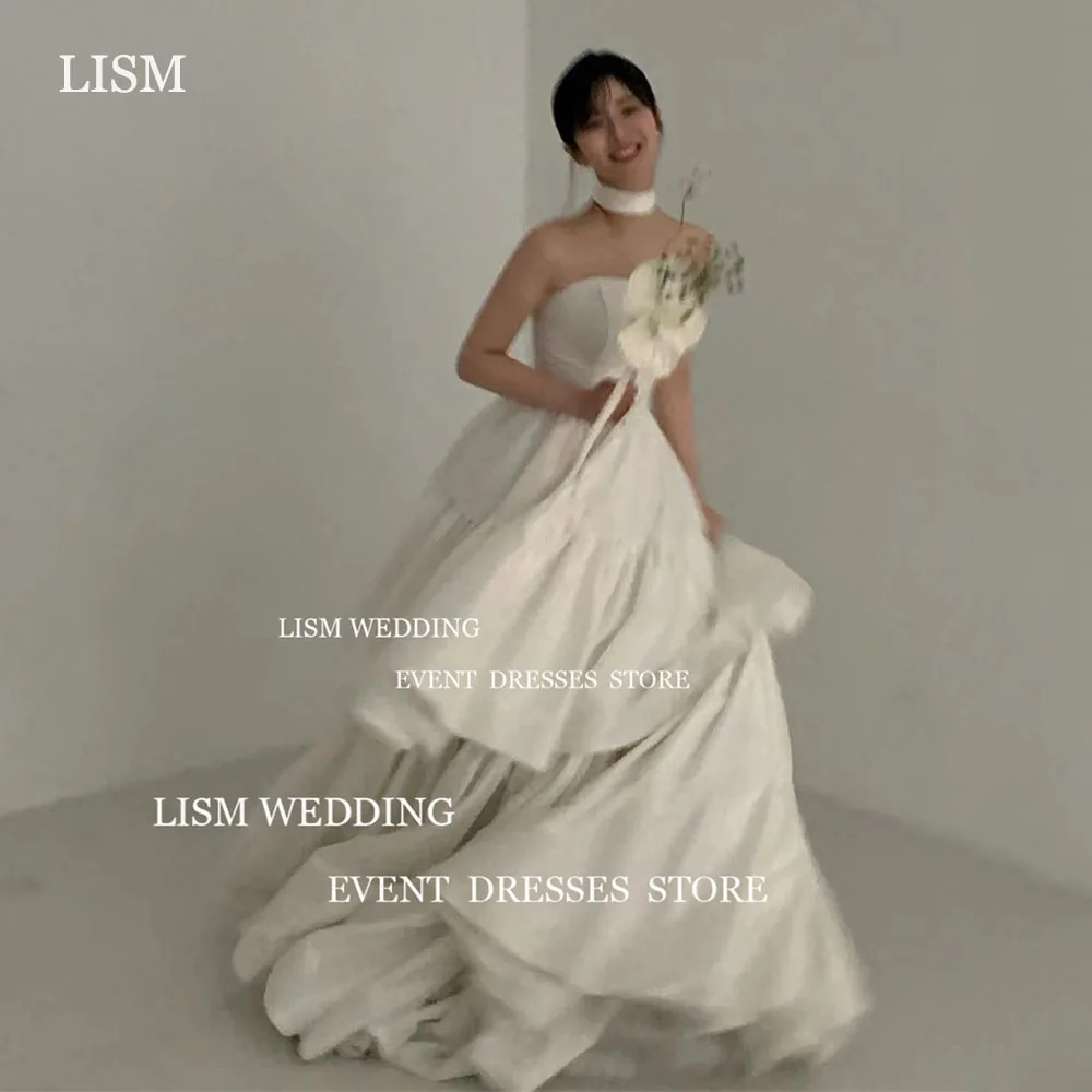 LISM Abiti da sposa coreani a strati senza spalline A Line 2025 Abito da sposa senza maniche senza schienale con lunghezza del pavimento del mantello Dende Personalizzato