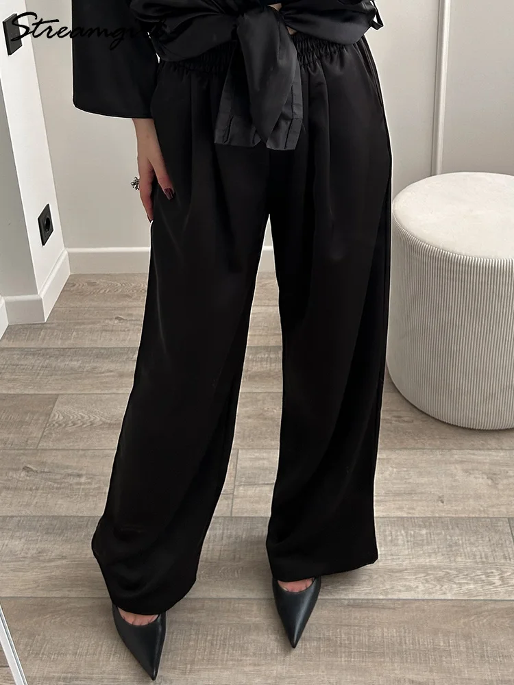 

Streamgirl Коричневые атласные брюки для женщин с карманами Формальная офисная одежда Свободные шелковые брюки Женские черные женские широкие брюки, штани жіночі 2025 тренд