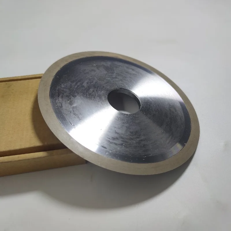 Finely ground diamond metal grinding wheels for grinding cemented carbide drill bits