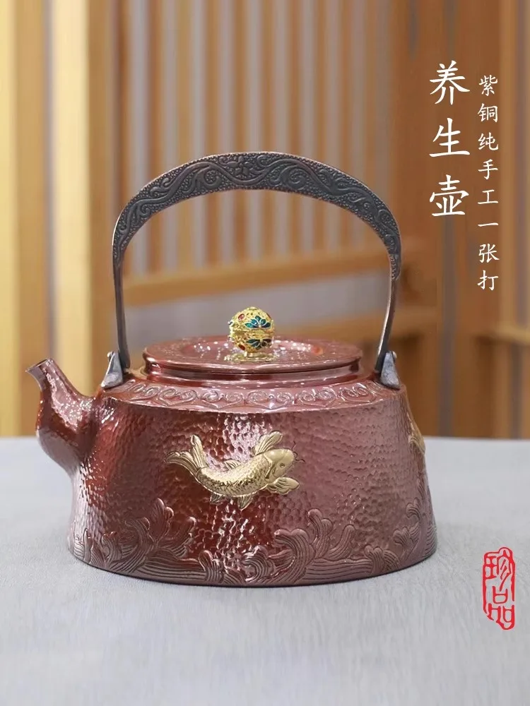 

Pure handmade copper teapot, kettle, surrounding stove, open flame for boiling tea, copper teapot, pure copper, purple copper, e