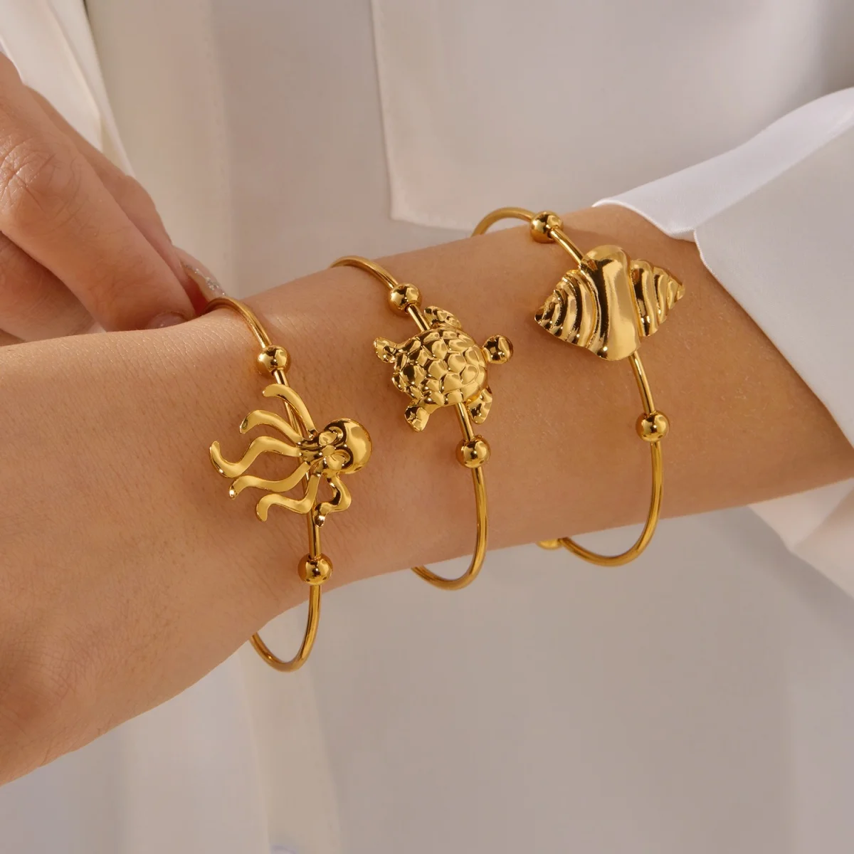 Einfache Edelstahl-Sonnenarmbänder für Damen und Herren, Gänseblümchen-, Muschel-, Spiral-, Oktopus-, Schildkröten-Armreif, Ozean-, Strand-, Urlaubsschmuck – Detail 5
