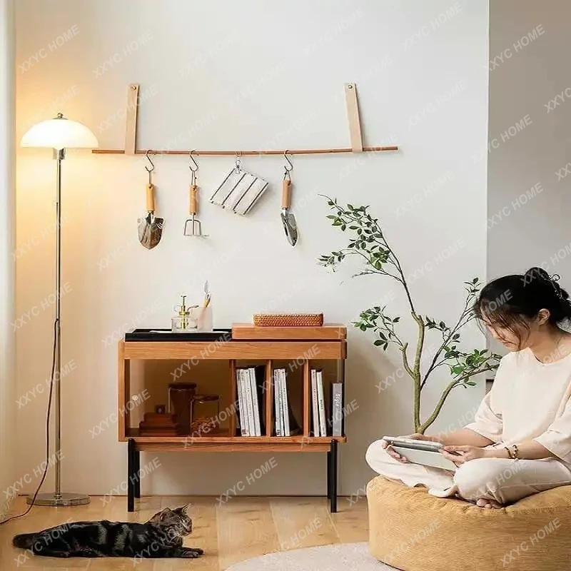 AArecord player, cherry short cabinet, Japanese sofa, solid wood, books and newspapers