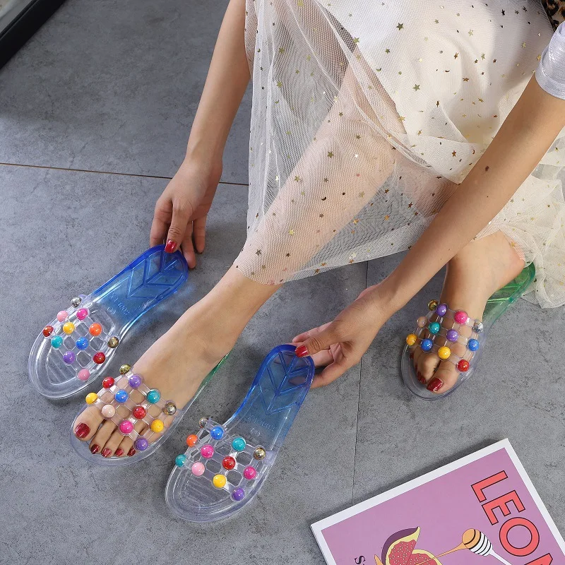 Women's indoor cute soft-soled sandals and slippers fashion beach anti-slip drag Korean transparent fruit shoes.
