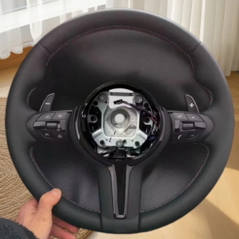 

Индивидуальный спортивный руль из натуральной кожи для BMW F10, F11, F15, F16, F20, F30, F31, F32, F36, F01, F02, E70, E71, E84, E87, E90, M3, M5