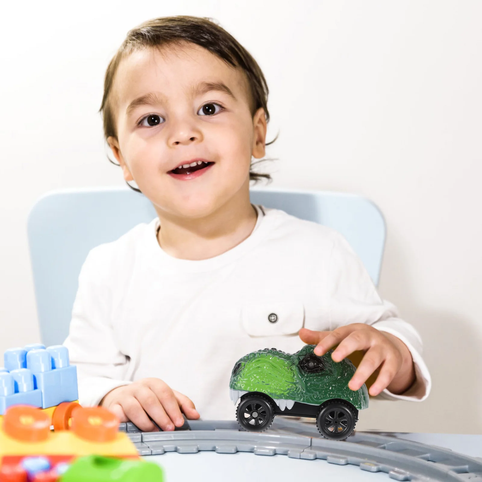 Dinosaurus auto speelgoedvoertuig kinderen spoor metro gloeiend vervangend speelgoed Abs