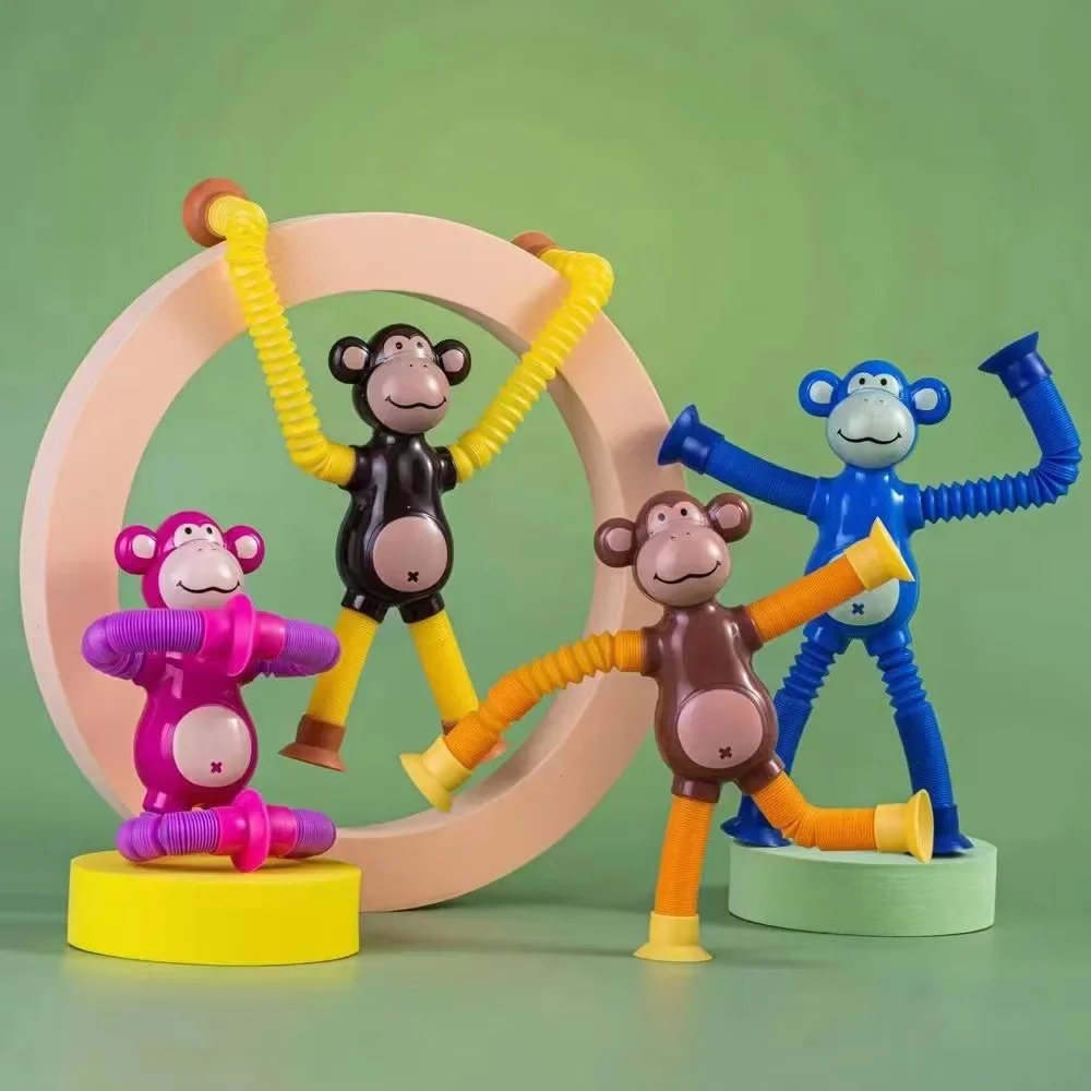 Telescopic Monkey Toy Fun Strange Decompression Stretch POP TUBE with Lamp Luminou Suction Cup Anti-stress Sensory Fidget Toys