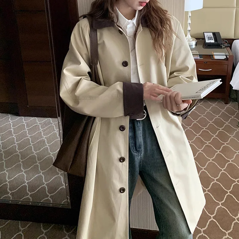 Trench coat di media lunghezza vintage stile college coreano per donna Capispalla beige allentato con risvolto monopetto chic alla moda