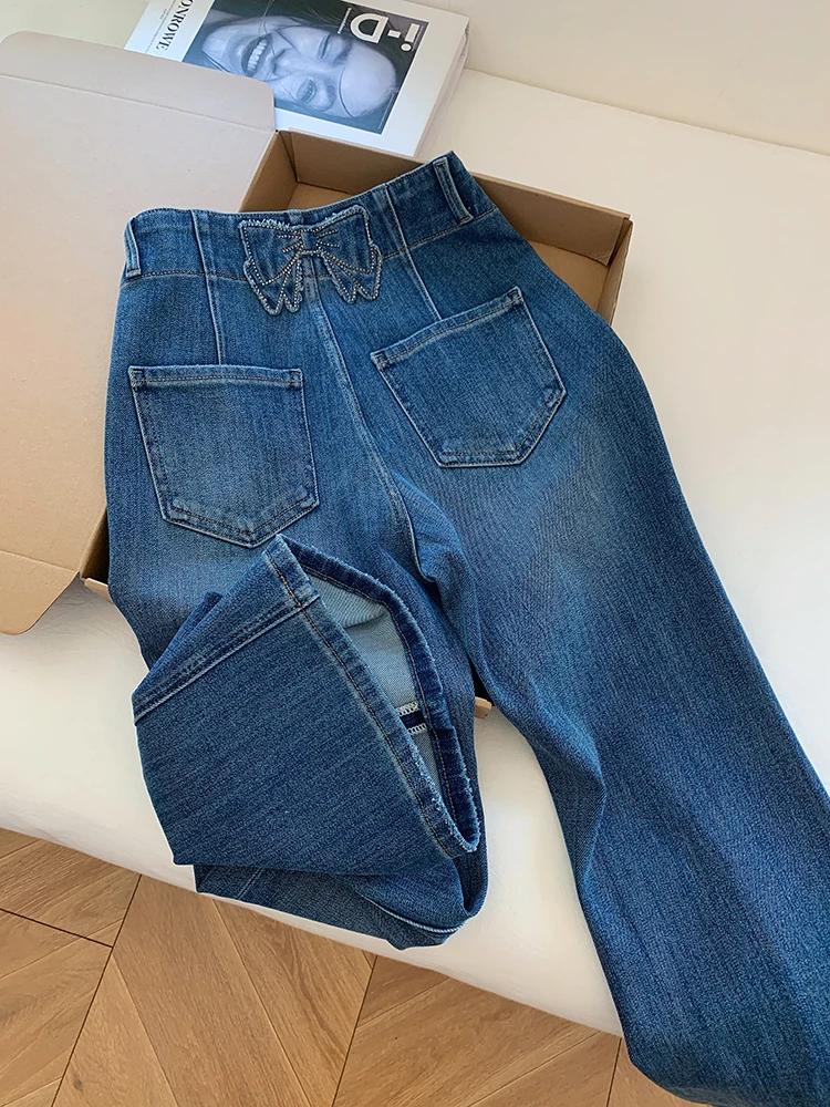 Amerykańskie Retro Spodnie Dżinsowe z Kokardą w Kolorze Niebieskim, Rozszerzane, Damskie, Casualowe, Dopasowane, z Wysokim Stanem, Jesienne, Nowe Modne Spodnie Jeansowe Damskie