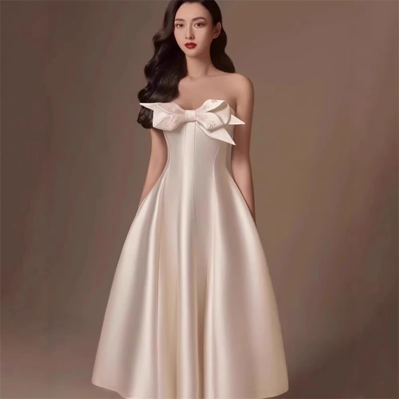 فستان ستان بحزام على شكل فيونكة ثلاثي الأبعاد بدون أكمام عند الصدر وسحاب عالي الخصر أنيق لحفلات الزفاف والسهرات للنساء