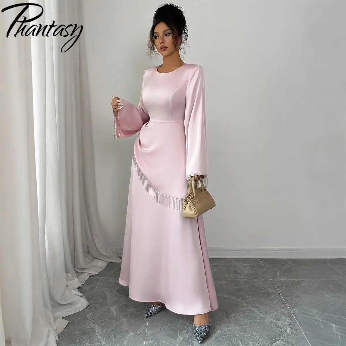 เดรสยาวแขนยาวสีชมพูสไตล์มินิมอลหรูหรา ดีไซน์พู่ห้อยสีพื้นใหม่จาก Phantasy เอวสูงลำลองสำหรับผู้หญิง ﻿