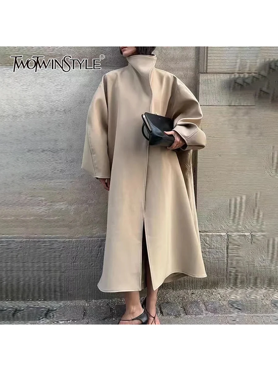 TWOTWINSTYLE Solid Spliced Pocket Loose Jacket for Women Round Collar Long Sleeve Patchwork Hidden Button Long Jackets Female