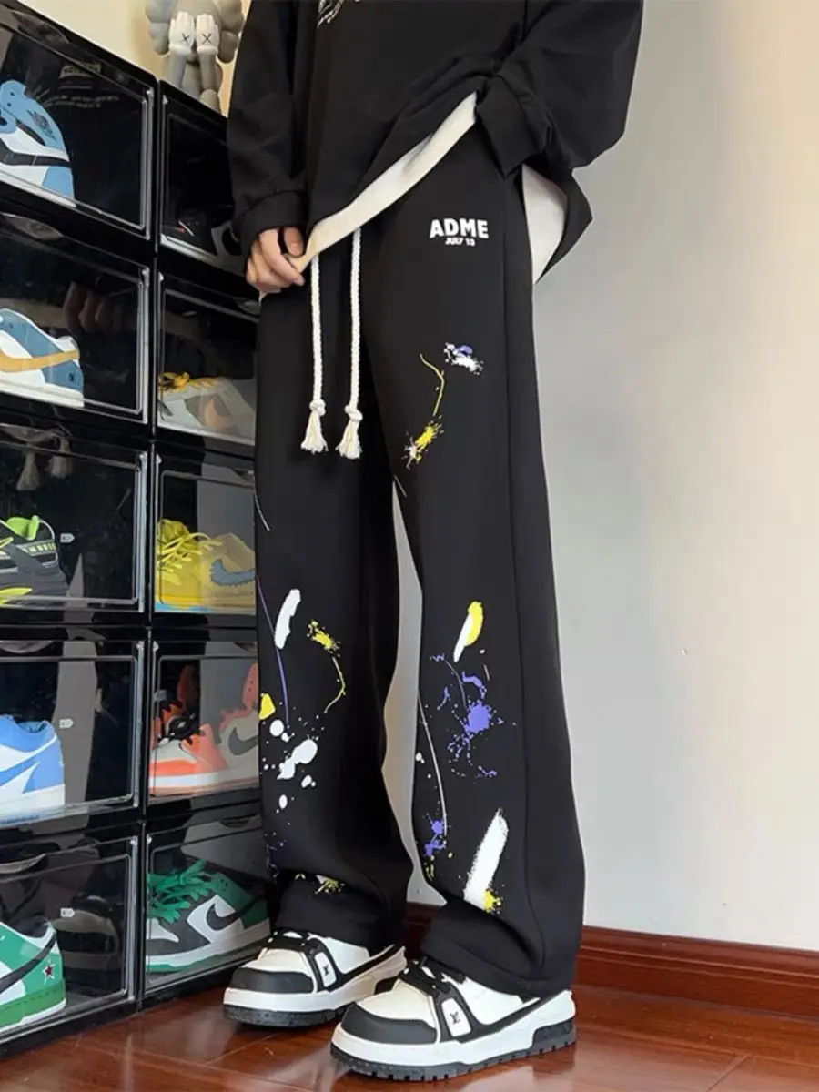 Designed graffiti sweatpants men's spring Korean style loose casual straight-leg sports pants versatile wide-leg harem pants