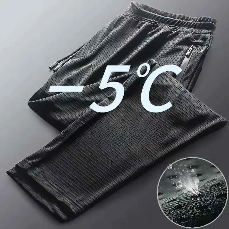 

Ultra-Thin Ice-Silk Sports Casual Pants for Men Qui-Dry Me Loose Nine-Point Cuffed Pants Straight Leg mid Waist Polyester...