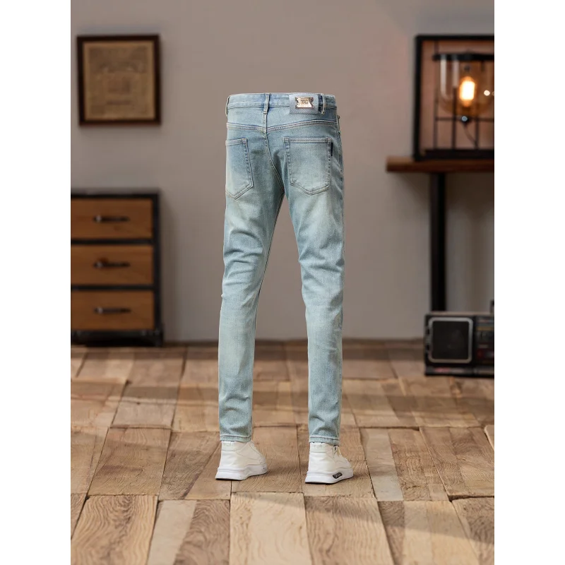 2025 جديد ريترو الضوء الأزرق الجينز الرجال العلامة التجارية العصرية تمتد سليم صالح أقدام صغيرة بسيطة عادية النسخة الكورية السراويل