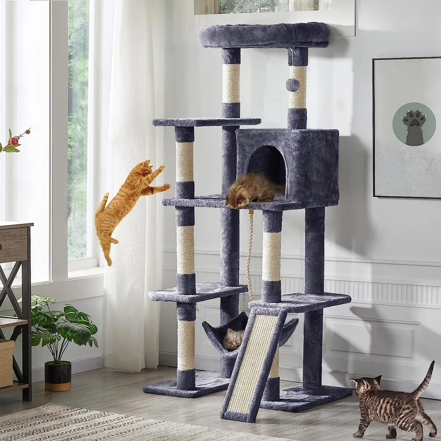 Large multi story cat tree, 63 inches high, equipped with sisal covered scratching columns, apartments, hammocks