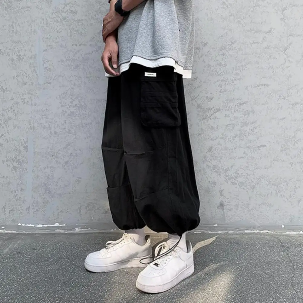 موضة السراويل الفضفاضة التجفيف السريع مطاطا زنار منتصف الارتفاع الذكور الهيب هوب واسعة الساق بنطلون طويل غير رسمي الرجال السراويل ملابس رياضية