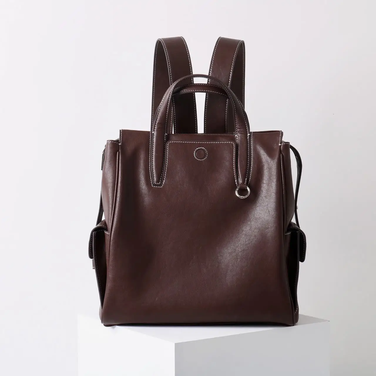 

2025 Casual Versatile Crystal Vegetable Tanned Cowhide Large Capacity Shoulder Commuter Computer Backpack Genuine Leather Bag