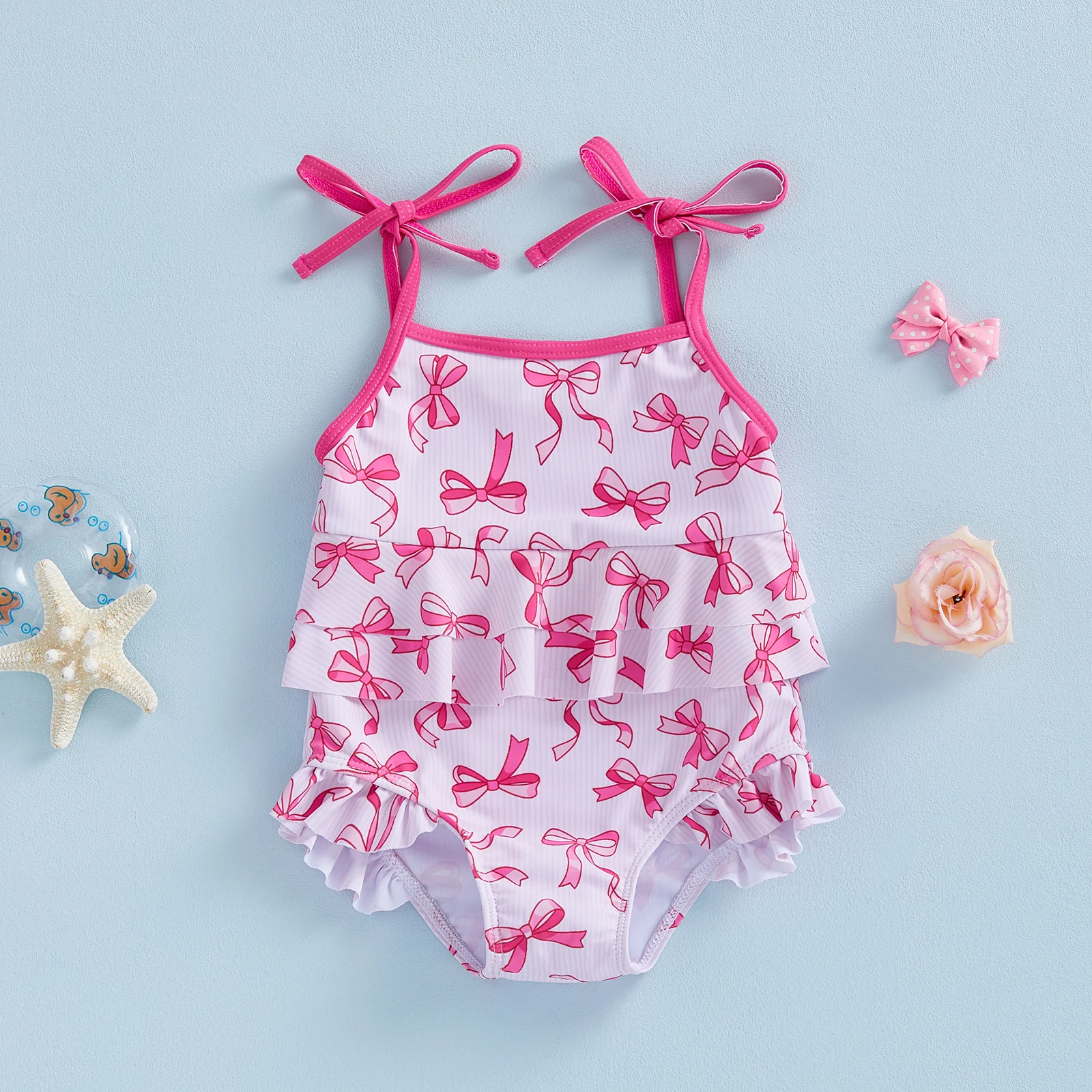 ملابس سباحة لطيفة بطبعات زهور مع حواف مكشكشة وتفاصيل فيونكة للفتيات الصغيرات - ملابس بحر للفتيات الصغيرات بدون أكمام مع
