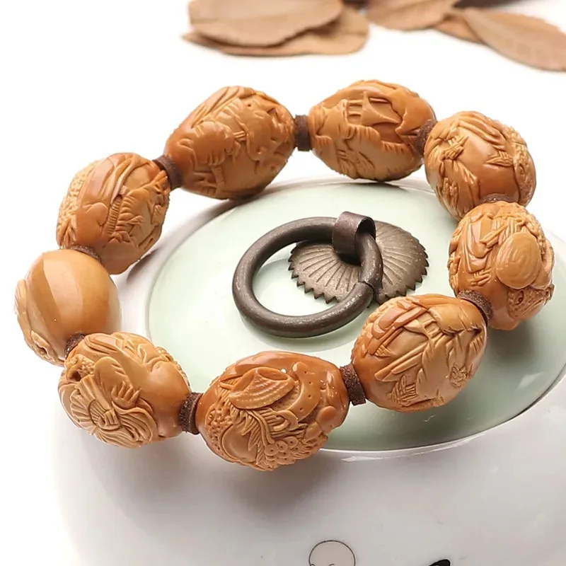 20 مللي متر الجوز على الوجهين تنقش ثمانية كنوز الذهبي جمع الحظ الزيتون هو يده