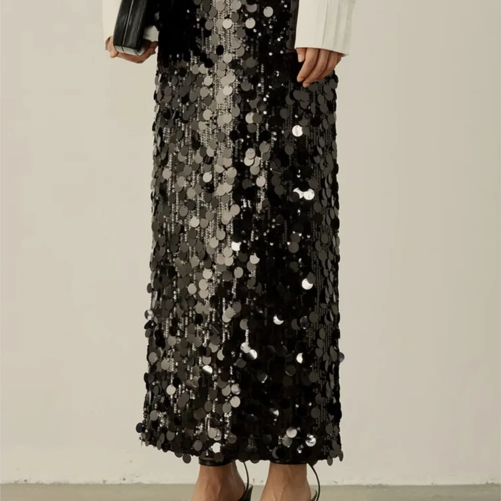 Autumn new elegant style sequin black straight through long skirt for women