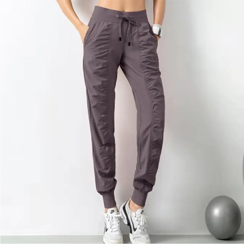 High-waisted Quick-drying Sports Pants Women\'s Loose Pleated Fitness Running Pants Were Thin Drawstring Harlan Casual Leggings