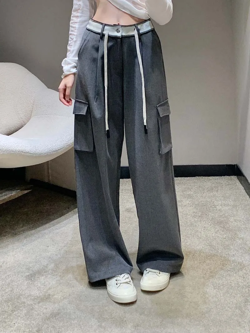 

Uniquely designed women's pants with trendy and stylish drawstring waist cinching workwear, large pocket wide leg pants