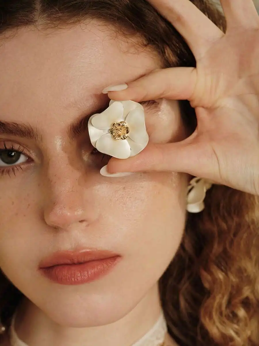 

Floral Stud Earrings With White Petal And Gold-Tone Center For Women Daily Wear