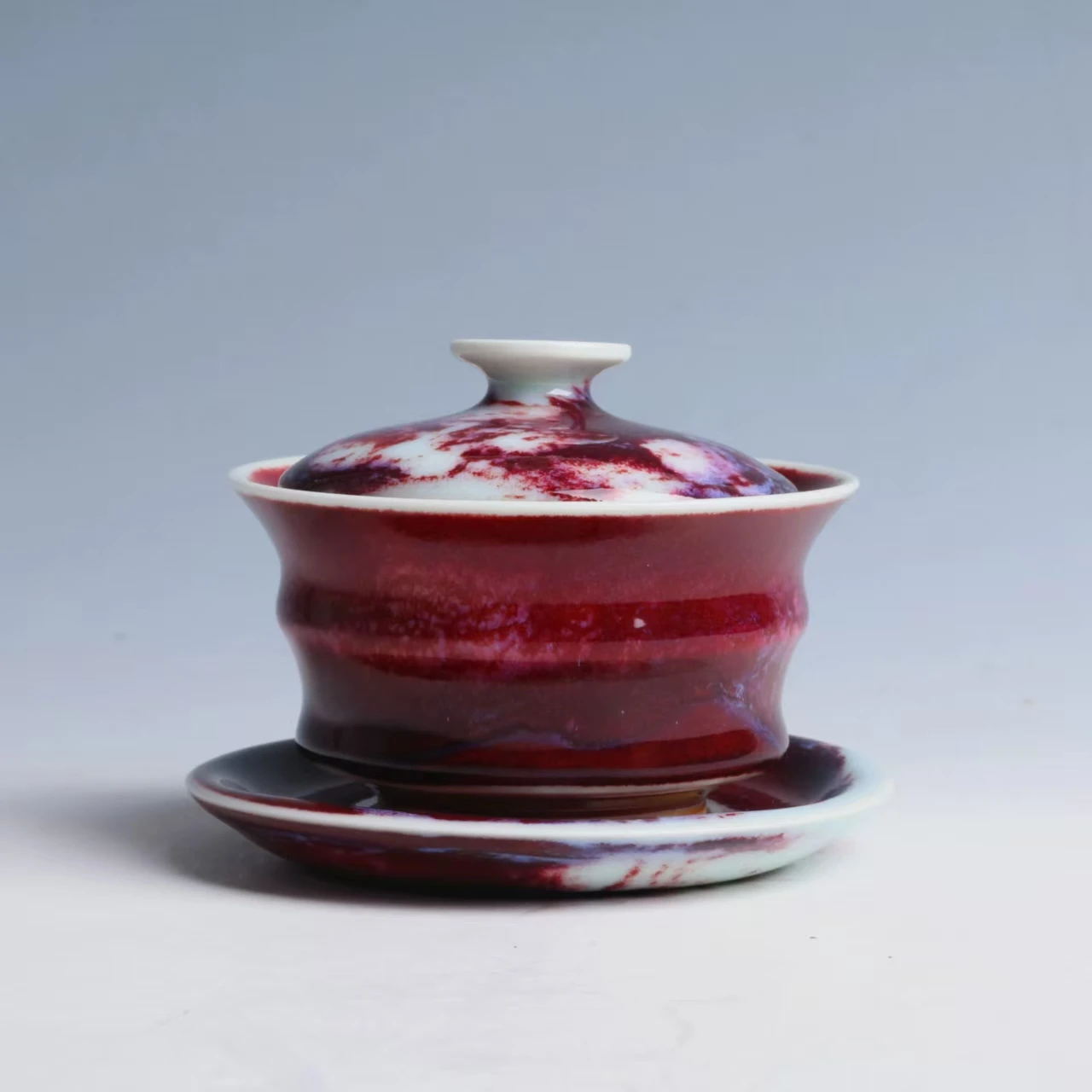 

Jun Kiln Coal-fired Smooth Lustrous Fully Handcrafted Chicken Blood Red Kiln Transformation Three-talent Tureen by Wang Dong Xu