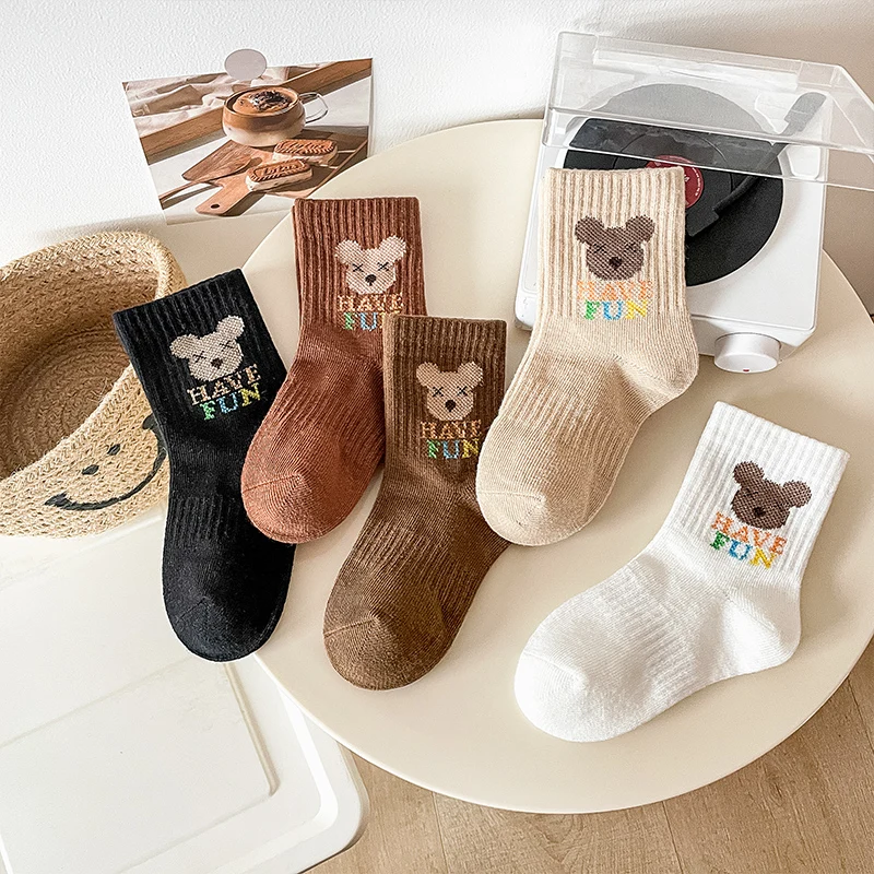 Five pairs of boys' autumn and spring soft and comfortable short socks in a trendy brown color scheme
