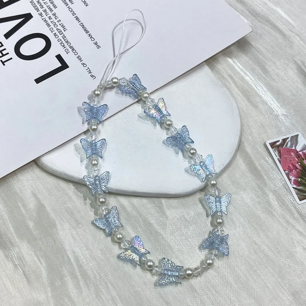 สายคล้องโทรศัพท์มือถือรูปผีเสื้อประดับลูกปัด สไตล์ Y2K ป้องกันการสูญหาย สีลูกกวาด พวงกุญแจโทรศัพท์พลาสติกน่ารัก