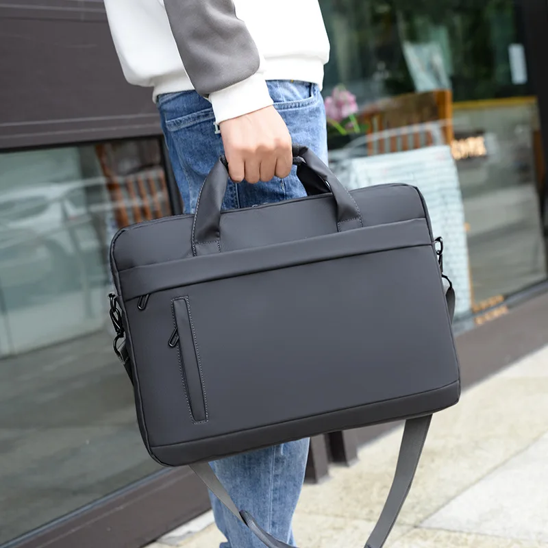 Waterproof leather film large-capacity men's handbag, 15.6-inch computer storage, single-shoulder business commuting briefcase