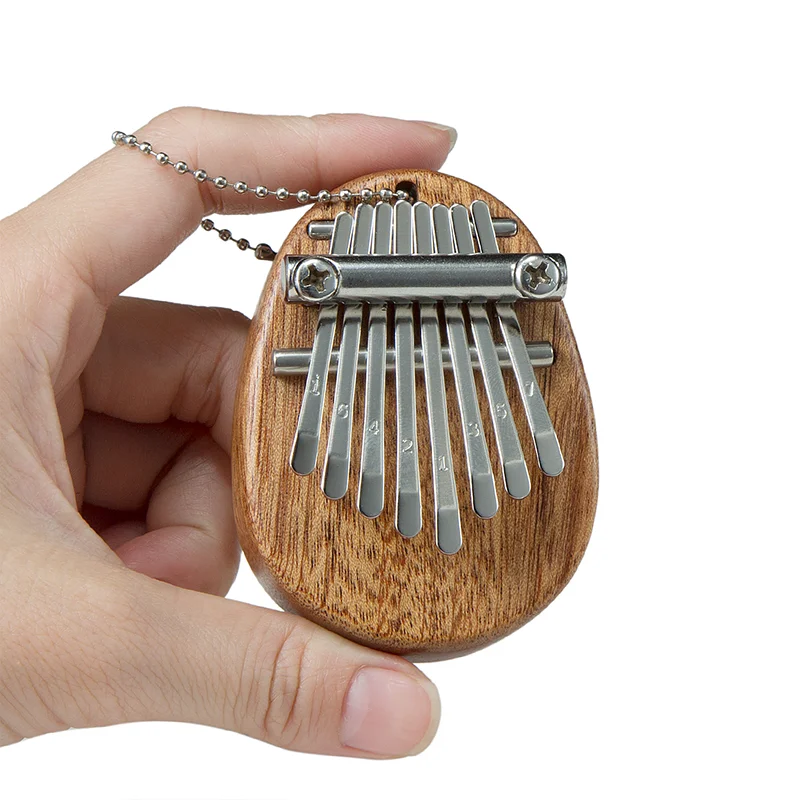 8 Key Mini Kalimba exquisite Finger Thumb Piano Marimba Musical Good Accessory Pendant Gift