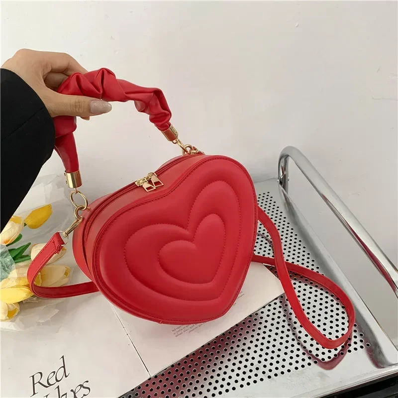 Retro heart-shaped cute bag fashion shoulder messenger bag solid color girl new shopping handbag