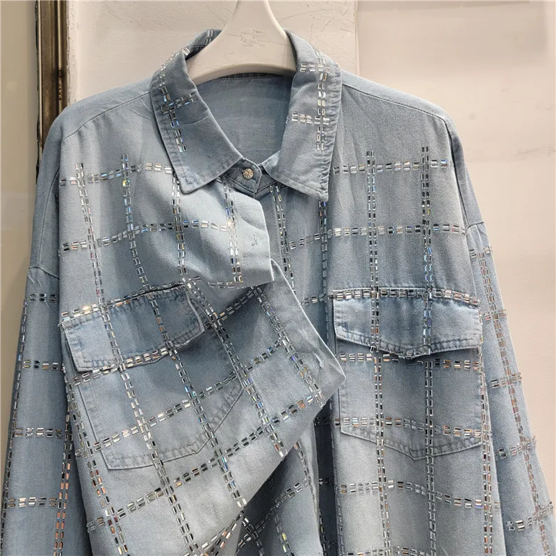 European-style denim shirt with heavy sequin embroidery. Artisan oversized fit, a versatile standout piece.