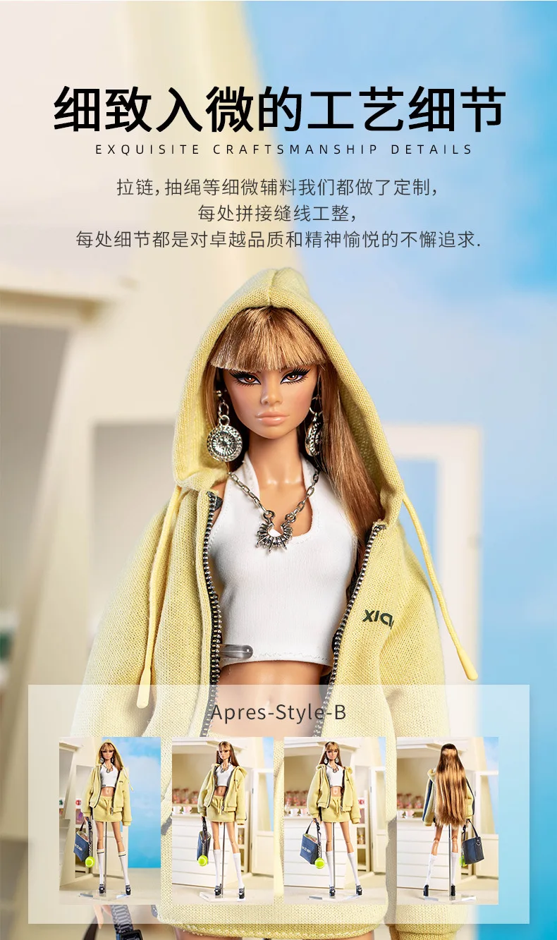 Ein 30-cm-Puppenkleidung-Set für Sportbekleidung mit einer Barbie-Puppe, die eine hellgelbe, kapuzenartige Jacke mit Stickerei „Xia“ auf der linken Brust trägt, kombiniert mit einem weißen Crop-Top und silbernen Schmuckstücken