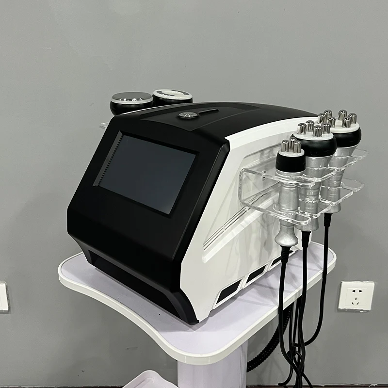 แบบพกพา 5 In 1 40K Cavitation อุปกรณ์กระชับใบหน้าอัลตราซาวนด์สูญญากาศเครื่อง RF Lifting อุปกรณ์กระชับสัดส่วนสุขภาพความงาม