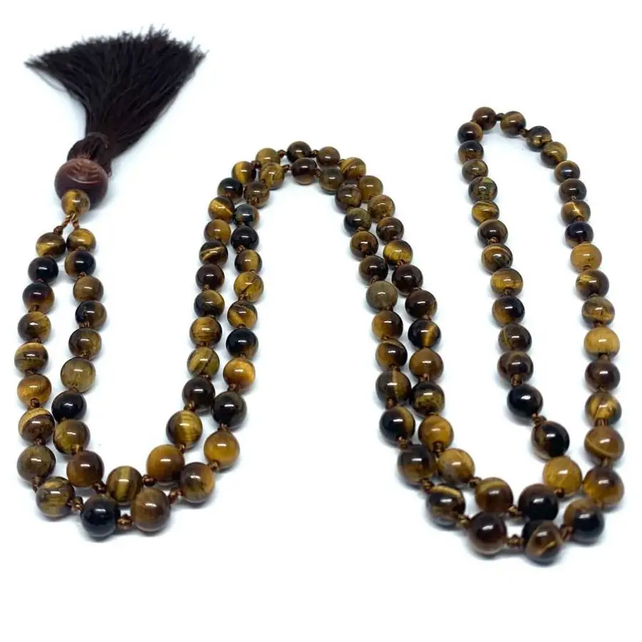 

Натуральное ожерелье-мала из 108 бусин тигрового глаза и черного оникса с коричневым кисточком: Кристаллы для храбрости, защиты и исцеления