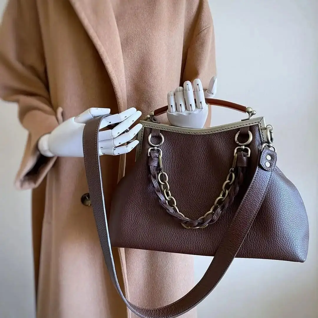 

Lost in Vintage Larger Natural Leather Bag with Antique Metal Frame Kiss Lock Opening and Mock Tortoise Top Handle 33x26x10cm