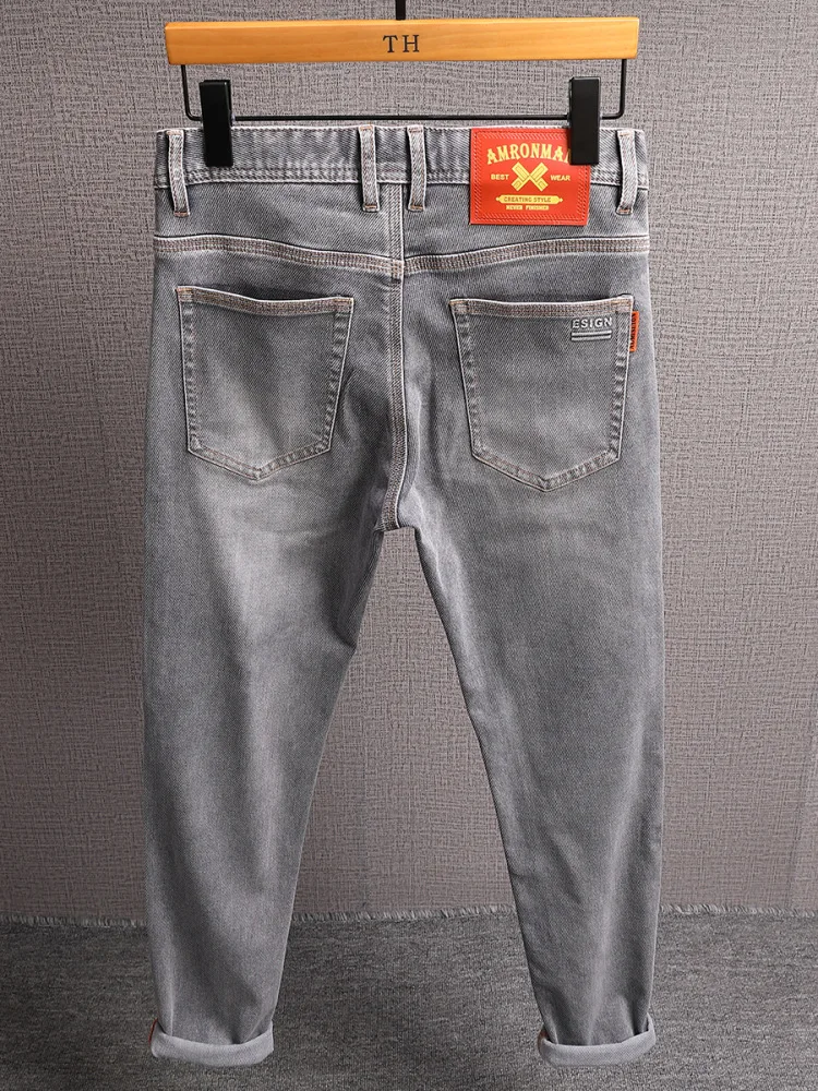 Pantalones vaqueros de tela de sarga suave de alta gama para hombre, pantalones elásticos pequeños de pierna recta, informales, a la moda, ligeros y de lujo