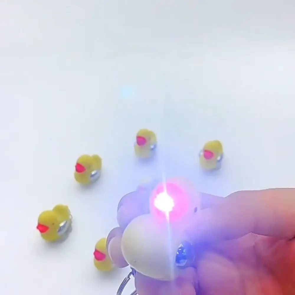 

Creativity Funny Electric Shocking Duck Keychain Cartoon With LED light Bag Ornaments Portable Prank Toy for April Fools' Day