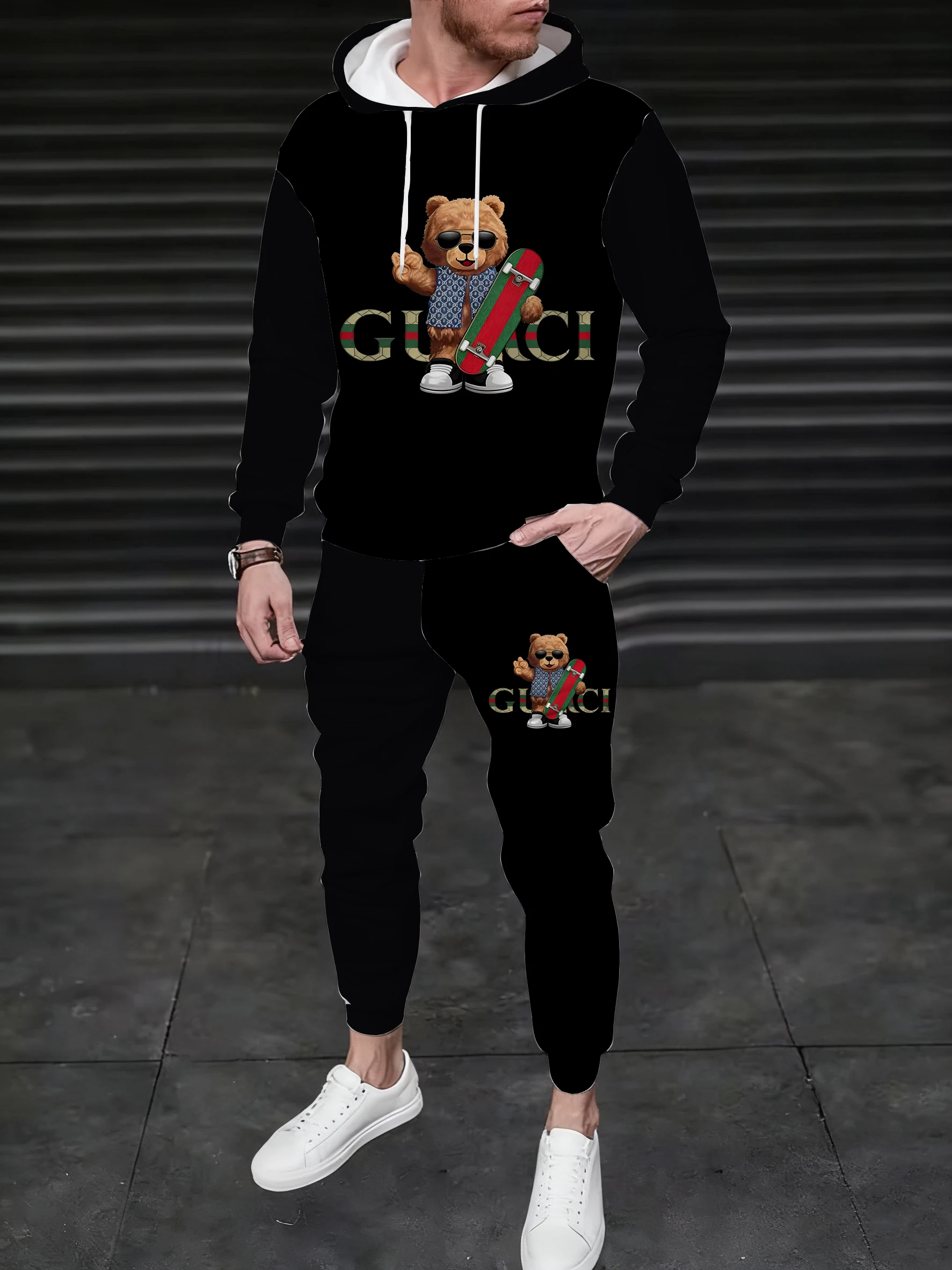 

A men's hooded sweatshirt paired with sweatpants, printed with a teddy bear pattern, exudes a versatile street style