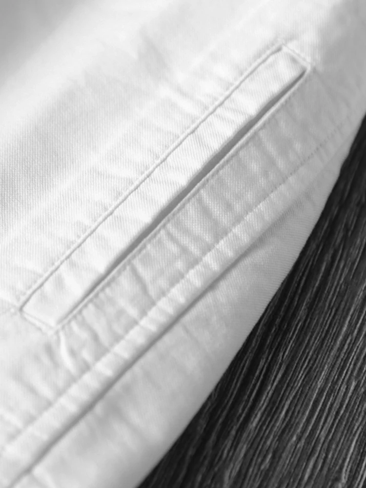 سترة نسائية كاجوال بيضاء طويلة Sve irt فضفاضة تناسب الوقوف طوق التخسيس منتصف طول سترة مفتوحة تصميم علوي الإحساس ربيع 2025