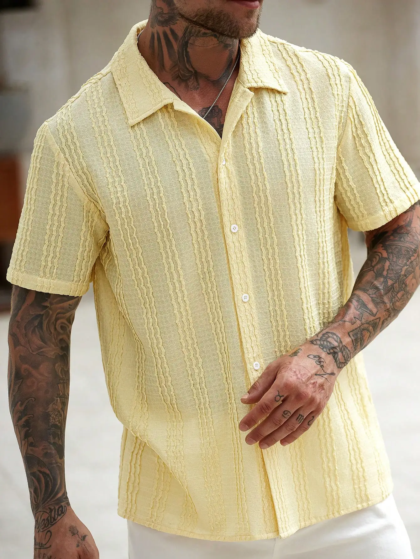 

Men's Light Yellow Short-Sleeve Casual Shirt with Textured Vertical Ribbed Pattern