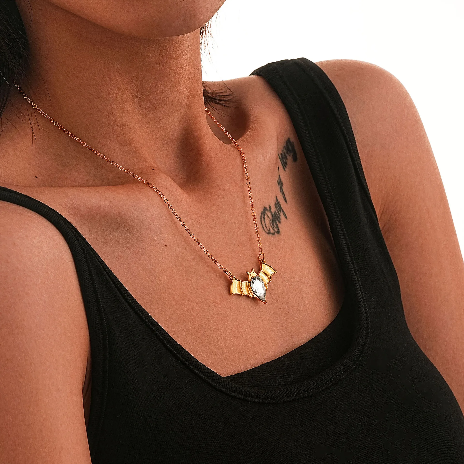 

Fashionable Golden Bat Pendant Large Rhinestone Necklace