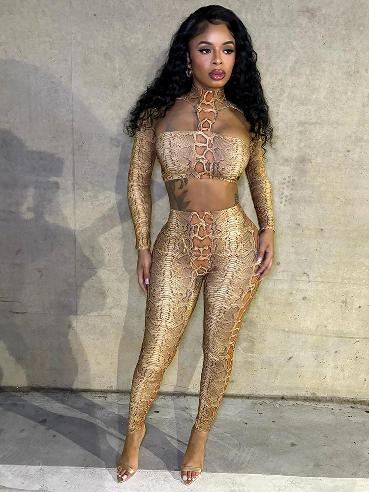 Sisterlinda バックレス スネークプリント 2 ピースセット女性ヒップスター中空胸ラップクロップトップ + レギンスセクシーなストレッチクラブウェア衣装
