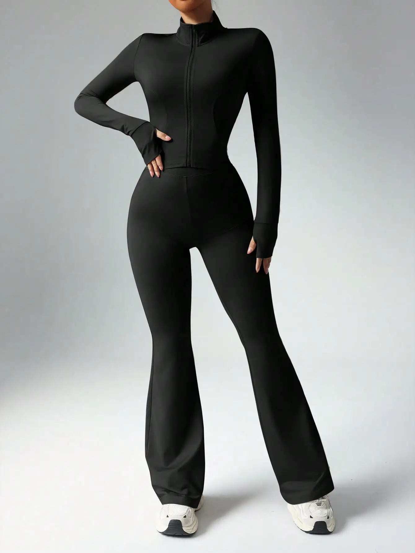 مجموعة ملابس رياضية ضيقة بأكمام طويلة وسراويل طويلة بلون سادة للسيدات من BWQ