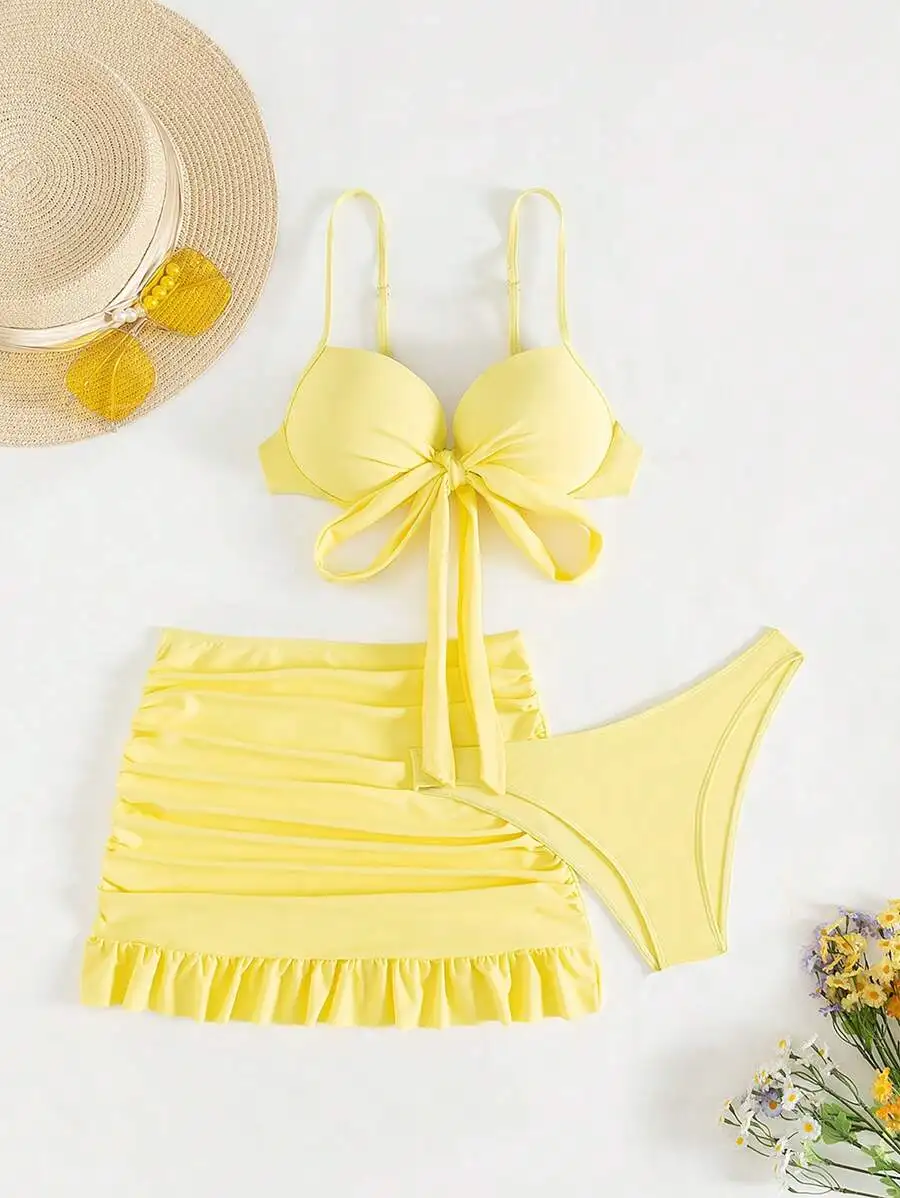 

Yellow Solid Knot Front Push Up Bikini Set With Ruched Beach Skirt Three Piece Swimwear